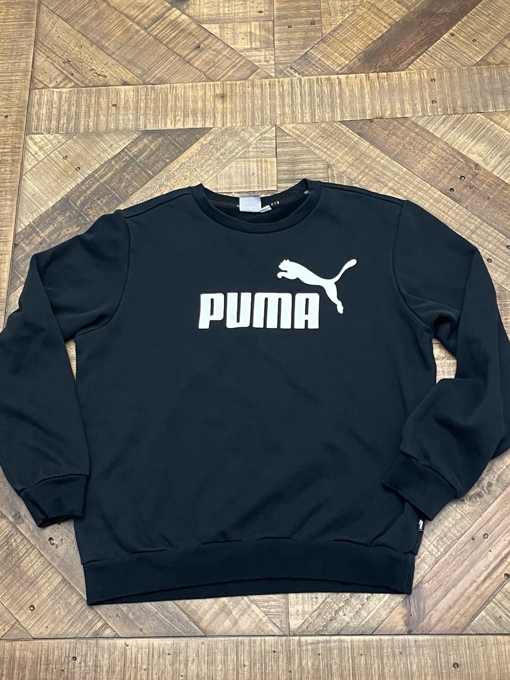 the PUMA Essentials Big Logo Crew Neck Sweatshirt